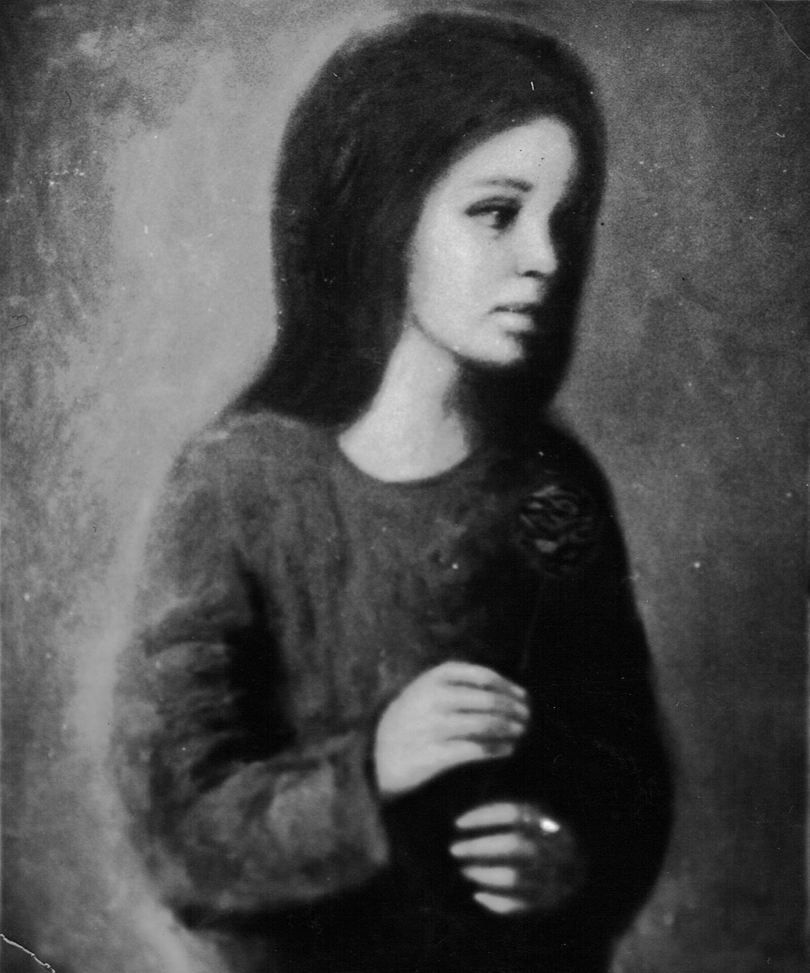 Niña con flor